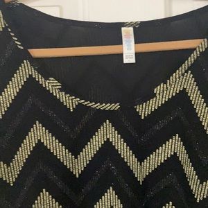 Shimmering black and white dressy LuLaRoe blouse